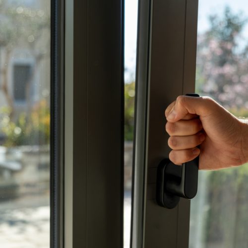 Tilt,And,Turn,Grey,Color,Aluminum,Window,,Man,Holding,The